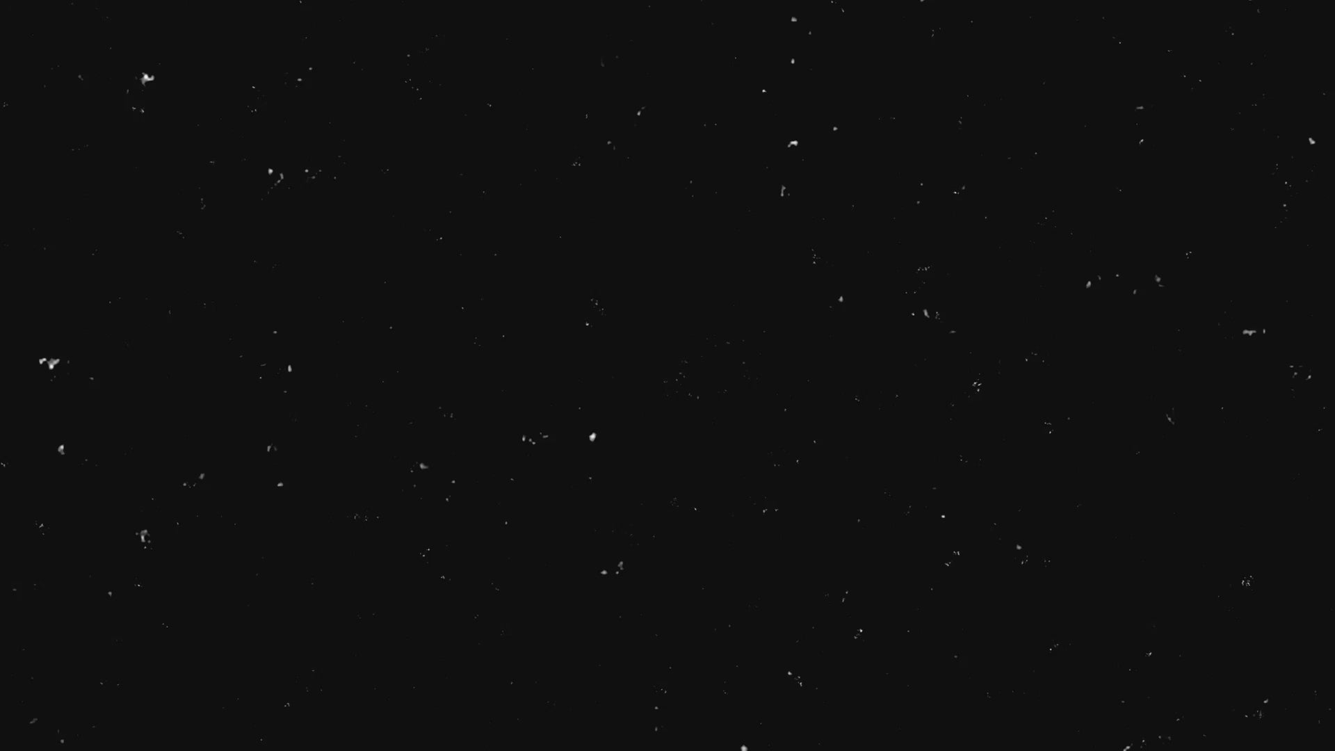 Black video with white specs floating around