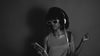 woman dancing with headphones on